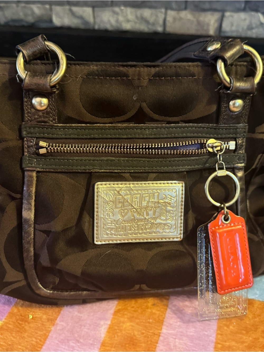 Coach Dark Brown Signature Canvas Shoulder Bag with Orange Tag